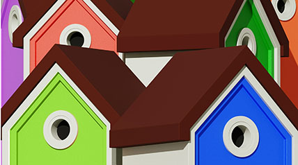 colorful houses iwith brown roofs in an abstract close up pattern
